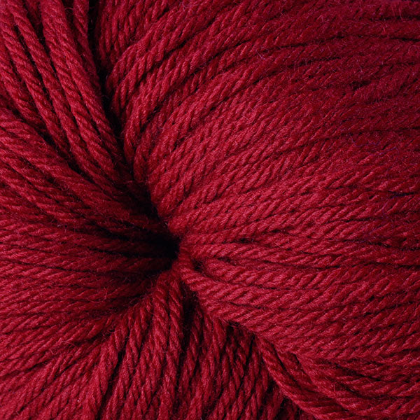 Berroco Vintage Worsted weight yarn in the color Sour Cherry 5134, a bright candy red.