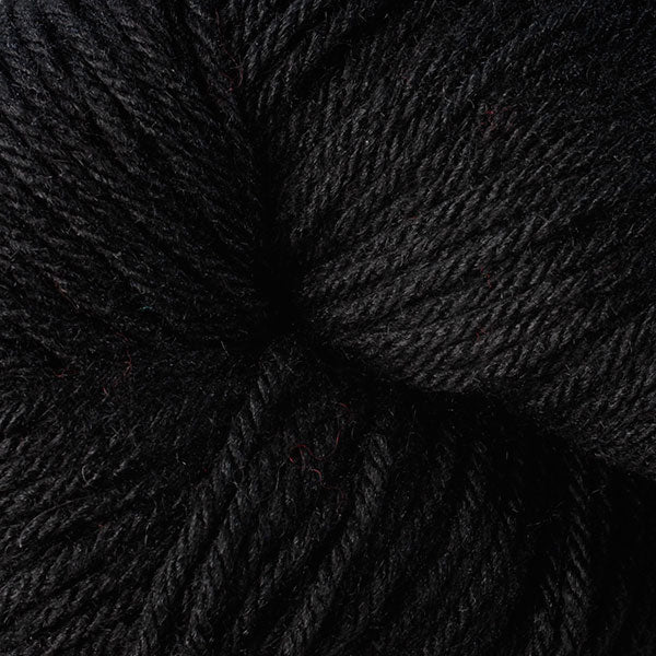 Berroco Vintage Worsted weight yarn in the color Cast Iron 5145, a deep black.