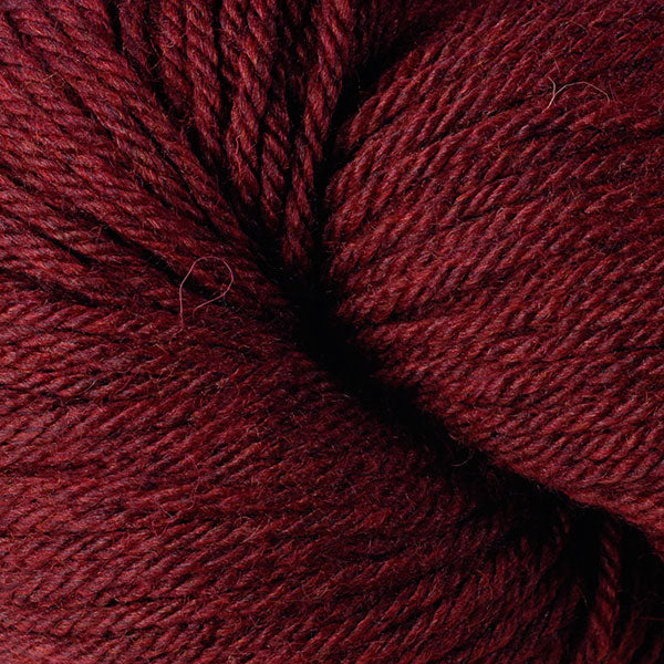 Berroco Vintage Worsted weight yarn in the color Black Cherry 5181, a dark red.