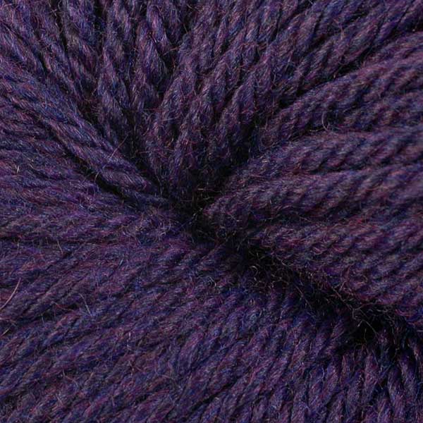 Berroco Vintage Chunky weight yarn in the color Aubergine 6190, a dark heathered purple.