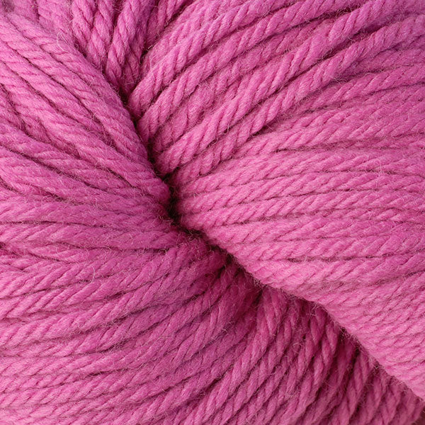 Berroco Vintage Chunky weight yarn in the color Blush 6123, a bright pink.