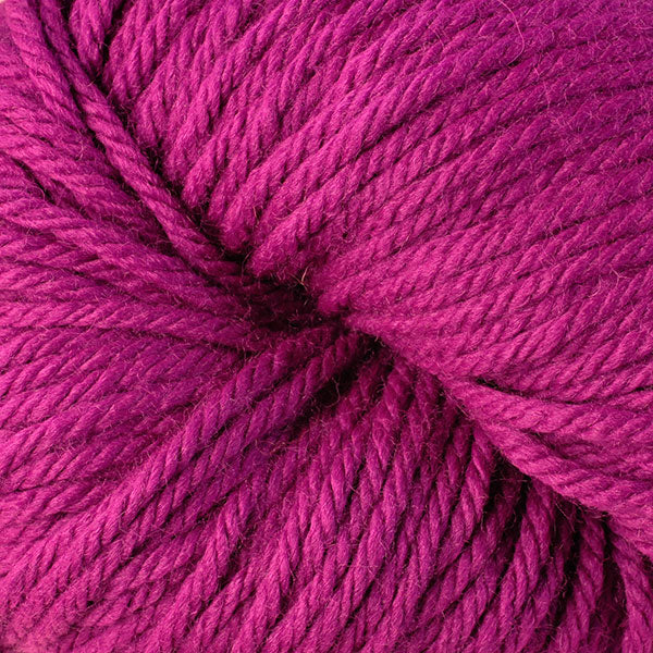Berroco Vintage Chunky weight yarn in the color Dewberry 6167, a bright purple-pink.
