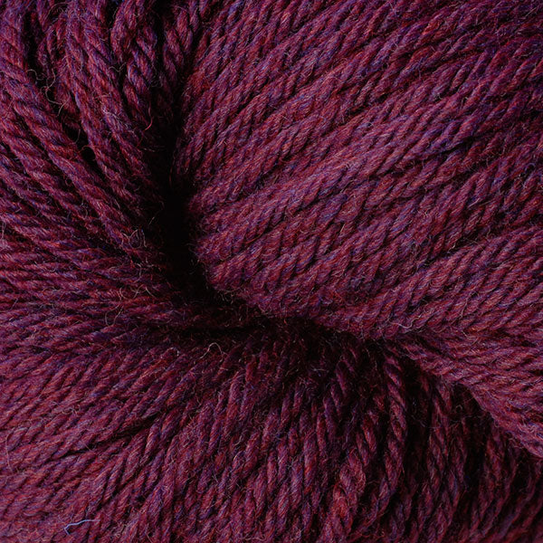 Berroco Vintage Chunky weight yarn in the color Black Currant 6180, a heathered burgundy.
