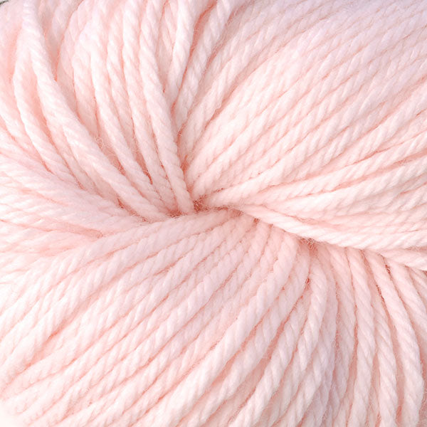 Berroco Vintage Chunky weight yarn in the color Fondant 6110, a light frosting pink.