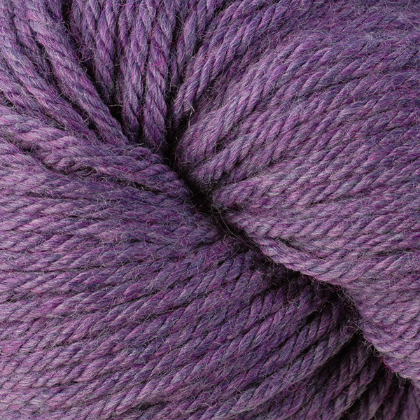 Berroco Vintage Chunky weight yarn in the color Lilacs 6183, a warm heathered purple.