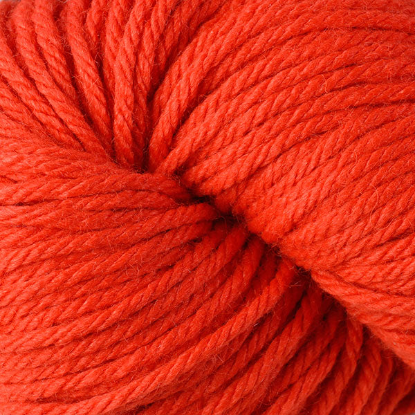Berroco Vintage Chunky weight yarn in the color Orange 6140, a very vibrant orange.