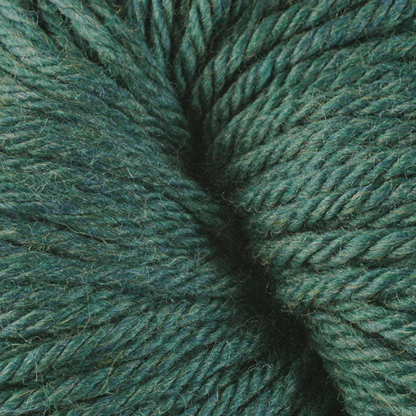 Berroco Vintage Chunky weight yarn in the color Yukon Green 6193, a dark forest green.