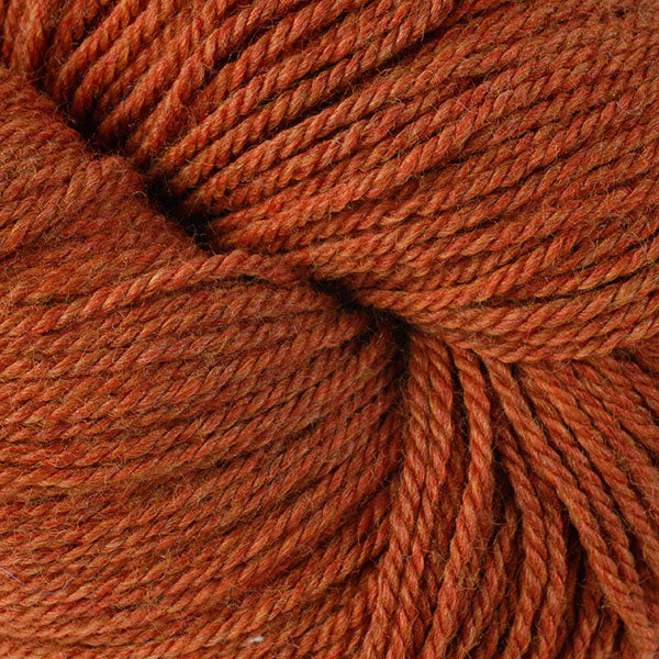 Berroco Vintage DK weight yarn in the color Pumpkin 2176, a heathered orange.