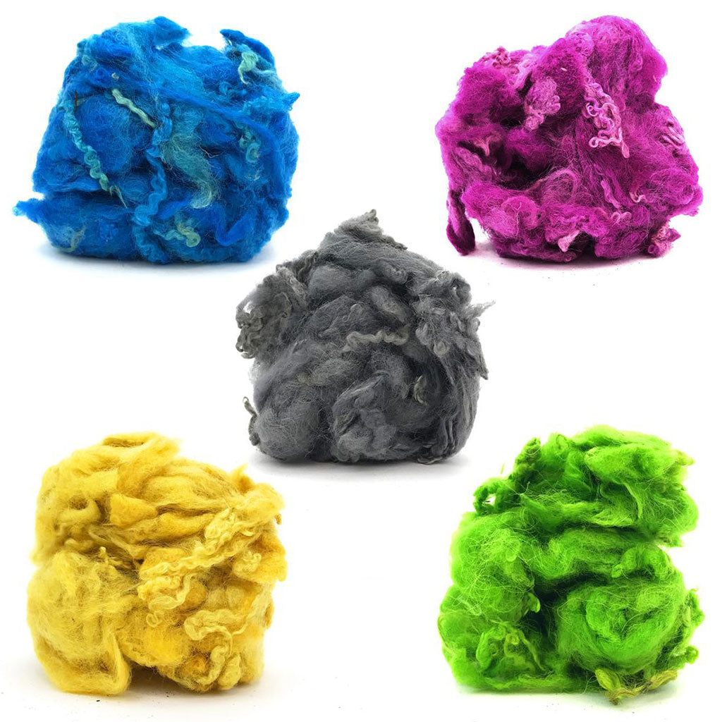 5 shades of dyed curly wool locks. One blue, fuchsia, grey, yellow, and green.