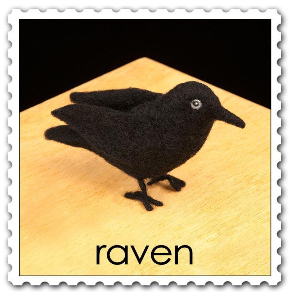 Woolpets raven needle felting kit - a black raven bird with white eyes